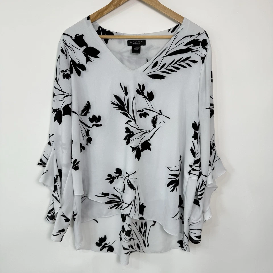 Blusa túnica Grace talla XL blanco roto con estampado floral negro mangas largas campana Foto 1 de 4
