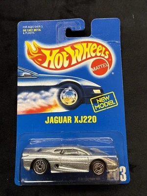 Jaguar XJ220 1993 Hot Wheels en plata con UH en tarjeta azul #203 Foto 1 de 4