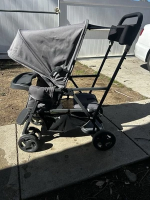 Joovy ultralight caboose double stroller with sit/stand and stroller make offer  - Image 1 of 4