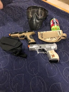 AIRSOFT GUNS SPRINGLOADED WITH HOLSTERS, MASK & BBs. EUC - Picture 1 of 1