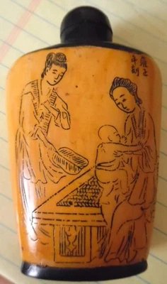 BLACK Snuff Bottle w carved figures,2 diff. scenes front & back, 3.5 H,2 1/8th W - Image 1 of 4