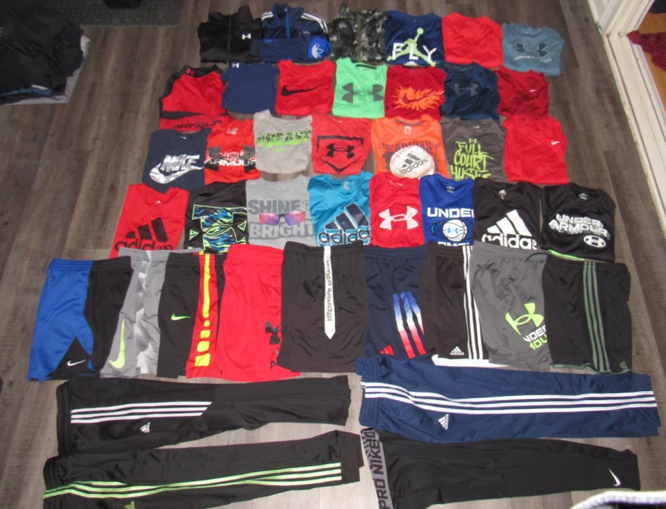 Lote 41 Piezas UNDER ARMOUR ADIDAS NIKE Niño Mediano 10 12 Camisas Pantalones Cortos Pantalones Jckts Foto 1 de 4