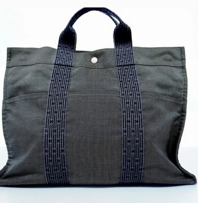 Auténtico bolso de mano HERMES Foure Tout de lona negro/gris con asa gris Foto 1 de 4