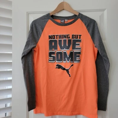 Camiseta Puma Nothing But Awesome Raglán Niños XL 18/20 Naranja Gris Foto 1 de 4