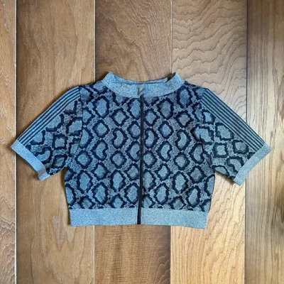 Top de entrenamiento para mujer leopardo negro y gris cremallera frontal ajustado recortado talla grande Foto 1 de 4