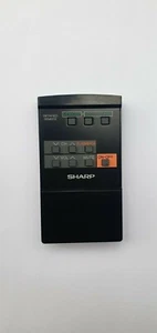 REMOTE CONTROL SHARP RRMCG0455CESA VIDEO ORIGINAL NEW G0455CESA - Zdjęcie 1 z 2