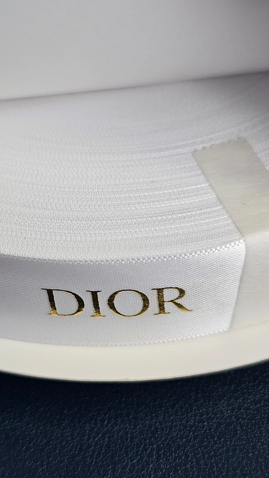 DIOR White Ribbon Roll of 50 Meter w/Gold Lettering (Width 20MM) HOLIDAY - Image 1 of 4