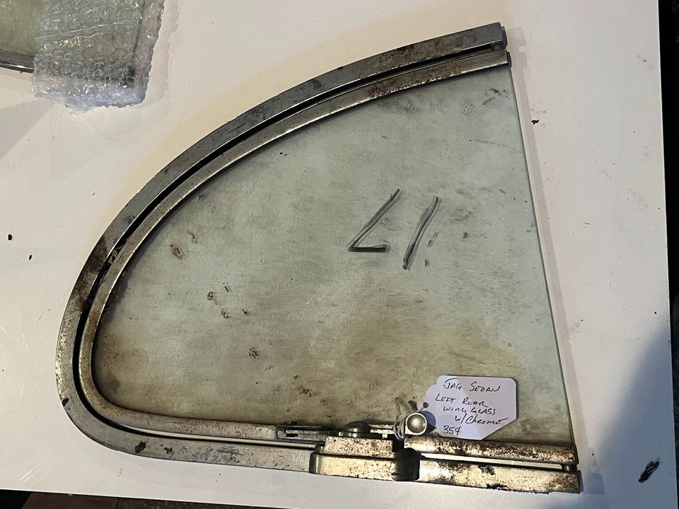 Cuarto ala trasera izquierda original Jaguar sedán cristal con cromo Foto 1 de 1