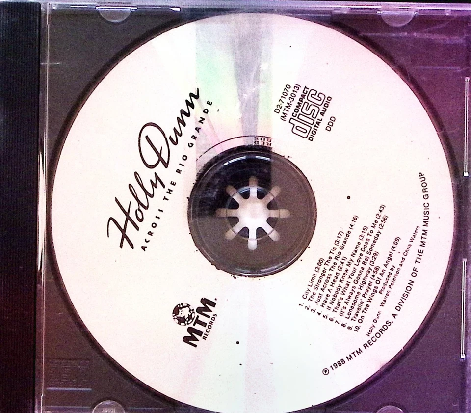 HOLLY DUNN – ACROSS THE RIO GRANDE - MTM RECORDS  CD 7494 Foto 1 de 2