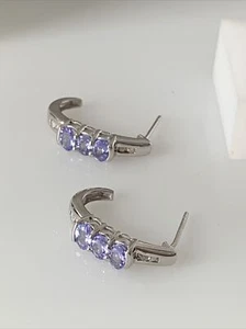 Orecchini in oro bianco 10 carati con tanzanite e diamanti, orecchini a mezzaluna T&C - Foto 1 di 5