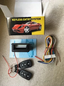 Universal Car keyless entry system and trunk, park lights, can lower window USA  - Bild 1 von 1