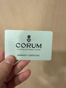CORUM WARRANTY CARD - Picture 1 of 2