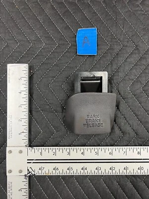 Dodge Ram 1500 1998-2001 manija de palanca de liberación de freno de estacionamiento gris oscuro OEM #706EM Foto 1 de 4