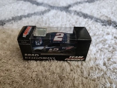 Экшн-фигурка Brad Keselowski No2 Miller Lite 2014 Ford Fusion 1:64 золотая серия  - Изображение 1 из 4