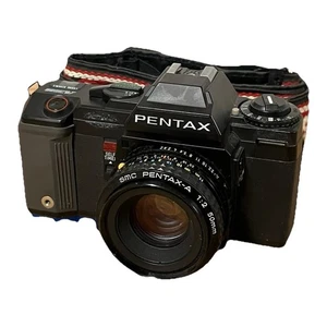 Appareil photo reflex argentique 35 mm vintage Pentax A3000 avec objectif SMC Pentax-A 1:2 50 mm - Photo 1/24
