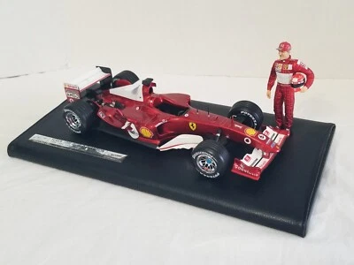 Raro coche de belleza exótica, siete veces campeón del mundo Michael Schumacher F2004 Foto 1 de 4
