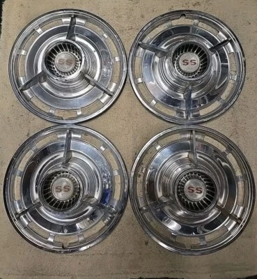 1963-64 CHEVY CHEVROLET IMPALA NOVA SS SPINNER HUBCAPS WHEEL COVERS SET OF 4 - Image 1 of 4