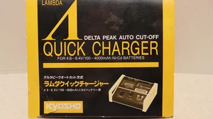 Cargador rápido Kyosho #1845 Lambda Delta Peak 4,8-8,4 V Ni-Cd nuevo en caja - Imagen 1 de 3