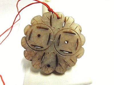 Vintage brown jade pendant on red cord rd open cut design sz 2 in wgt 29.4 grams - Image 1 of 4