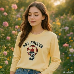 Abercrombie & Fitch Soccer Long Sleeve Tee 'We Score More' Yellow Graphic Y2K - Picture 1 of 8