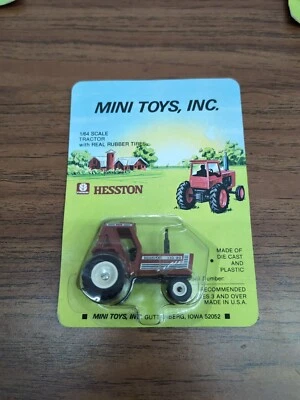 1/64 Mini Toys Hesston 130-90 Tractor  - Image 1 of 2