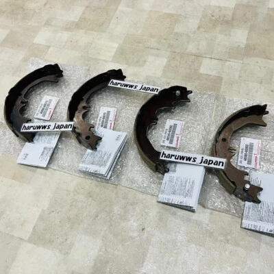 Juego de 4 zapatas de freno de estacionamiento originales Toyota 4Runner Sequoia FJ Cruiser genuinas nuevas Foto 1 de 4