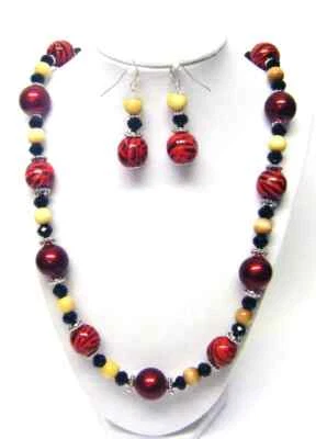 Juego de collar y pendientes de cuentas de madera remolino rojo y negro Foto 1 de 4