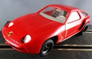 Carrera Universal 40423 - Porsche 928 Rouge Eclairage sans Boite 1/32 - Picture 1 of 8