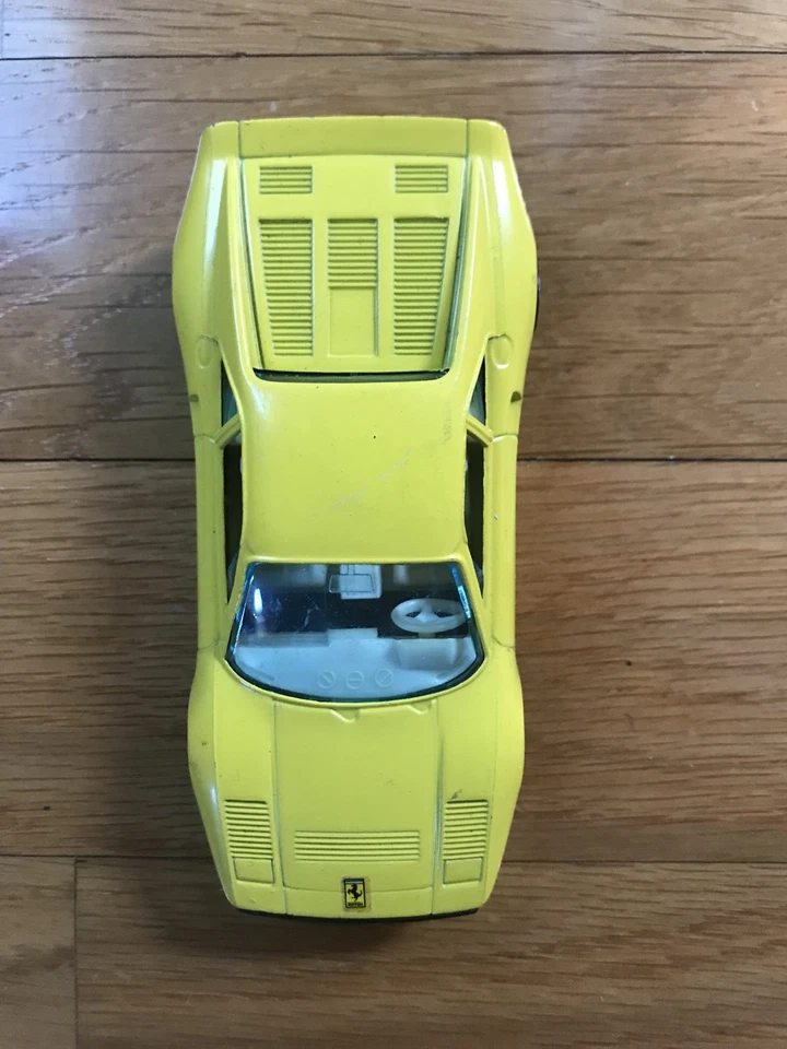 BURAGO auto car FERRARI GT scala 1/43 macchinina modellino GIALLA - Immagine 1 di 1
