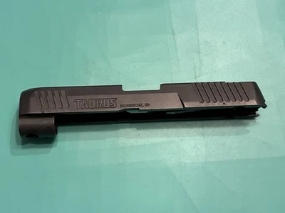 EXTRACTOR DE PERCUTOR USADO OEM TAURUS G3 9 MM DESLIZABLE ACABADO GRIS OSCURO SIN MIRA TRASERA Foto 1 de 4