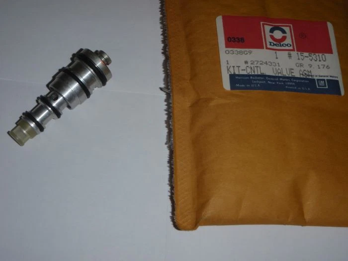 Válvula de control del compresor de CA NOS GM 85 86 87 88 Cadillac Cimarron 2724331 NUEVO Foto 1 de 1
