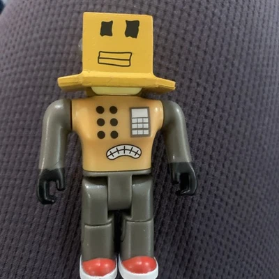 Figura de acción Roblox Serie 1 Builderman Mr. Robot Jazwares, sin código Foto 1 de 3