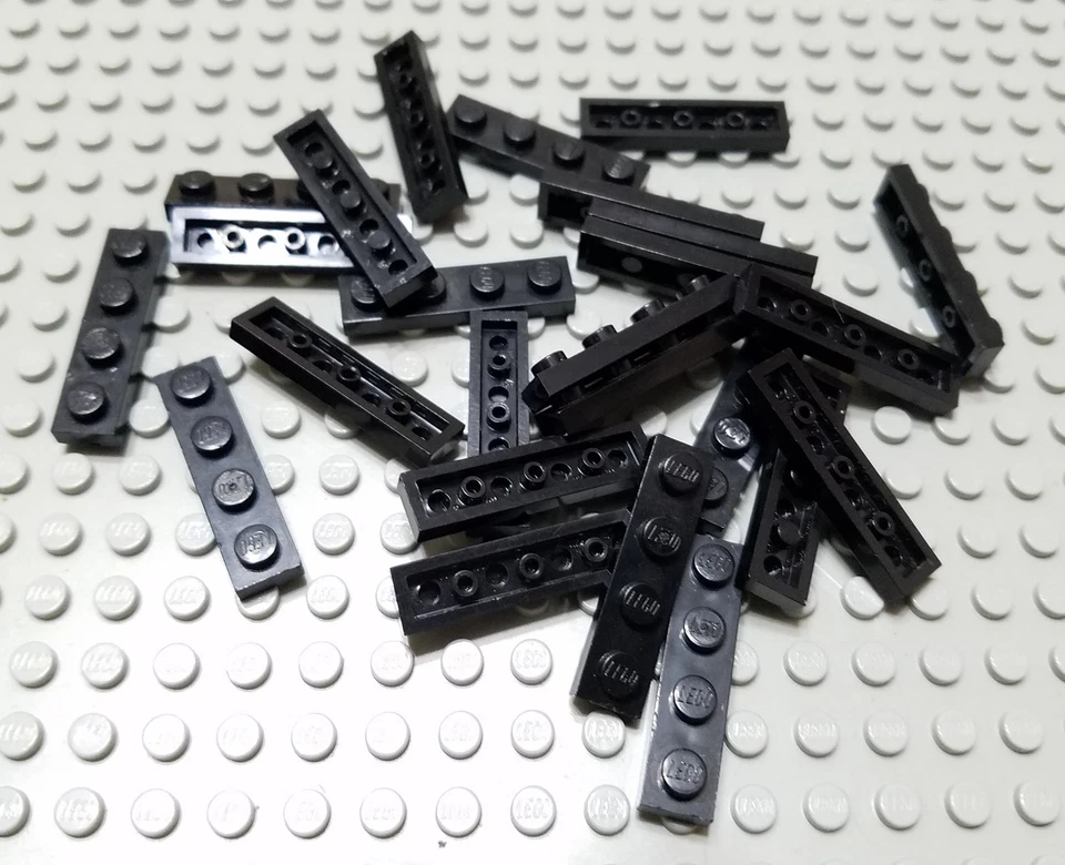 LEGO Lot of 25 Black 1x4 Creator Classic City Flat Building Plates - Image 1 of 1
