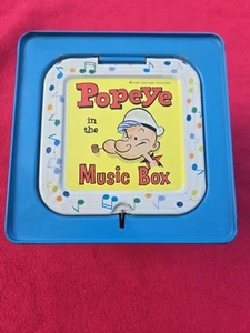 POPEYE SPIELUHR MATTEL 50er Jahre SPINAT BLECHDOSE JACK IN THE BOX SPIELZEUG - Disc lesen. - Bild 1 von 15