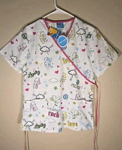 Care Bears Scrub Top Sz Small Care Bears Rock Pullover Tie Pink & White NWT - Picture 1 of 8