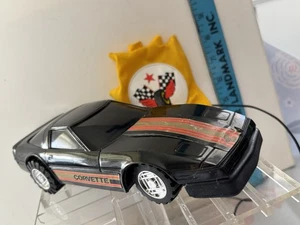Coche de control remoto Corvette negro con guante de control activado por el dedo probado funciona - Imagen 1 de 16