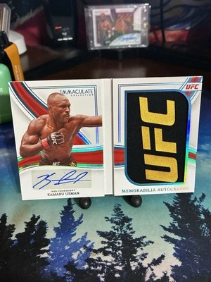 Kamaru Usman 3/3 BOOKLET AUTO UFC RELIC PLATINUM 2023 Panini Immaculate UFC - Image 1 of 3