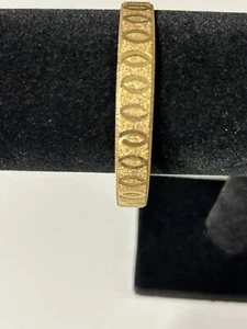 Gold Toned Bangle Bracelet with Oval Textured Designs - Picture 1 of 4
