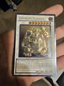 Yu-Gi-Oh Kolossaler Kämpfer Ultimate Rare EN-000 NM-VLP - Bild 1 von 11