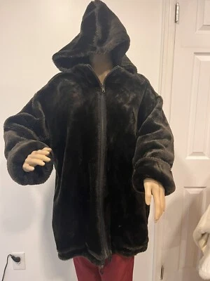 abrigo reversible forrado de piel con capucha Foto 1 de 4