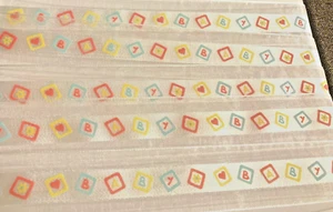 Decorative Craft Ribbon - White with Colourful Baby word Print 2.2M - Picture 1 of 4