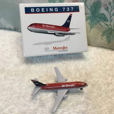 Schabak 1:600 MetroJet (US Airways) Boeing 737 DieCast Modelo Alemania 905/99 Usado en Excelente Condición Foto 1 de 4