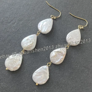 Pendientes de gancho colgantes de perlas Keshi barrocas blancas naturales del mar del Sur de 13x18 mm - Imagen 1 de 3