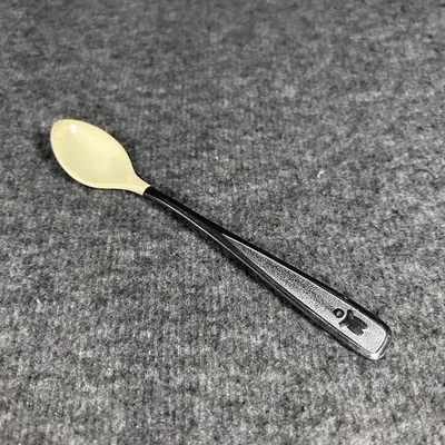 Cuchara de alimentación infantil de acero inoxidable vintage '80 los primeros años punta de goma suave Foto 1 de 4