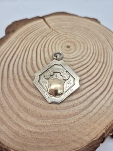Hallmarked Sterling Silver Watch Fob with golden inlay shield. - Picture 1 of 7