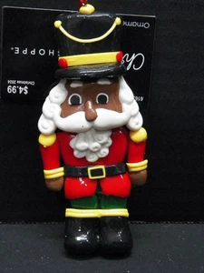 Christmas Shoppe Red & Yellow Black Hat Nutcracker Resin Ornament 4 3/4" - Picture 1 of 3