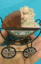Cute Miniature Baby Girl in Pram Doll House.Great gift for Christmas
