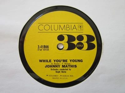 Johnny Mathis WHILE YOU'RE YOUNG How To Handle A Woman COLUMBIA 7" Single 33 EX - Image 1 of 2