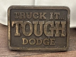 VINTAGE 1970s **TRUCK IT... TOUGH DODGE** ADVERTISEMENT BELT BUCKLE - Picture 1 of 1
