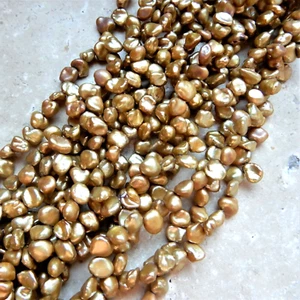 4 perle Keshi d'acqua dolce marrone oro 6 mm, bella lucentezza, per fare gioielli - Foto 1 di 5